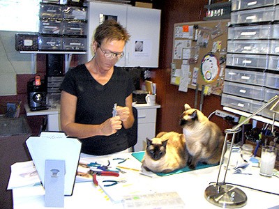 Jeanette in her studio with 2 helpers